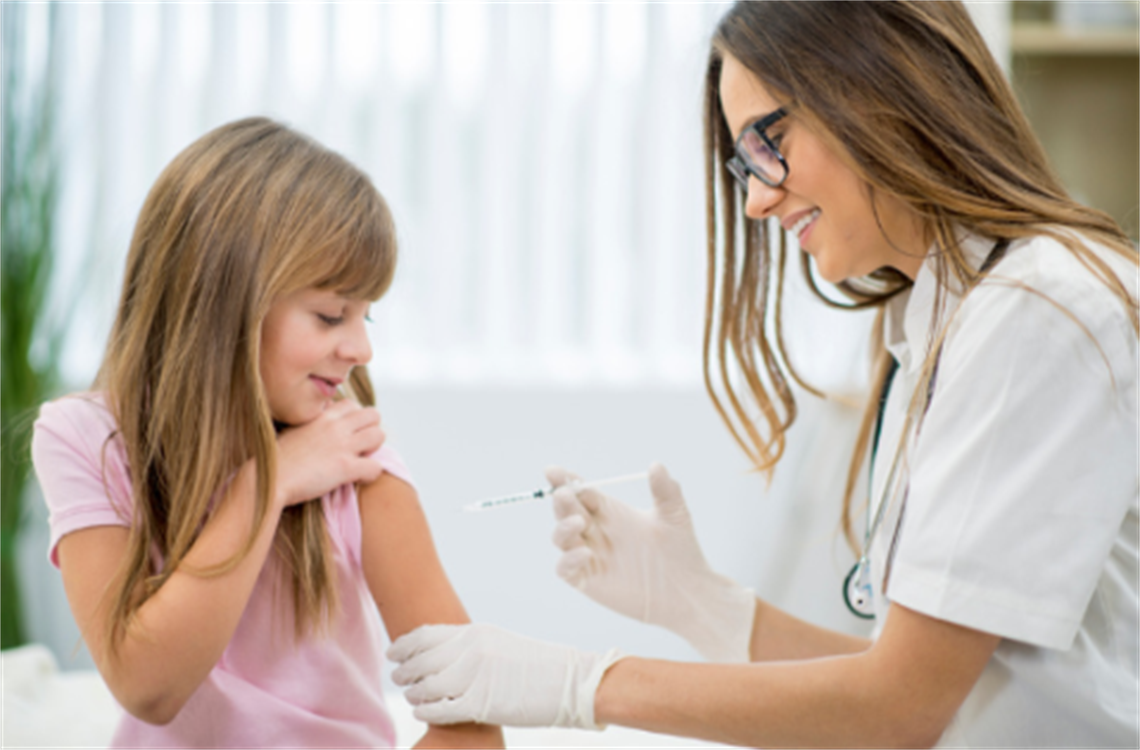 Little girl getting a flu shot
