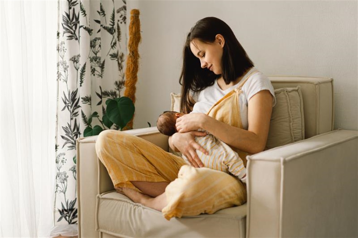Mother breastfeeding baby