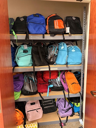 shelves of backpacks