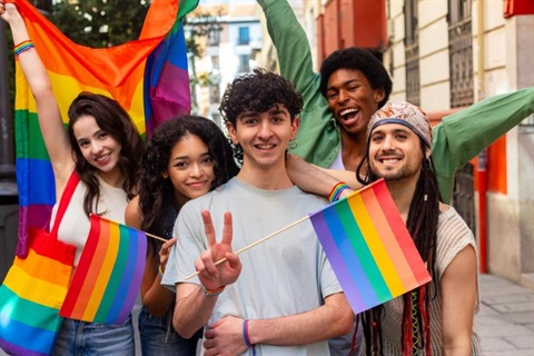 Pride community holding flags