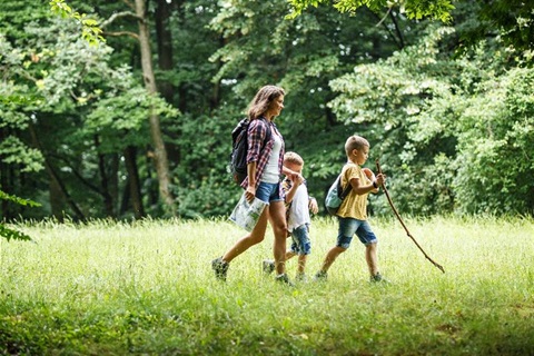Mother with sons on hiking adventure